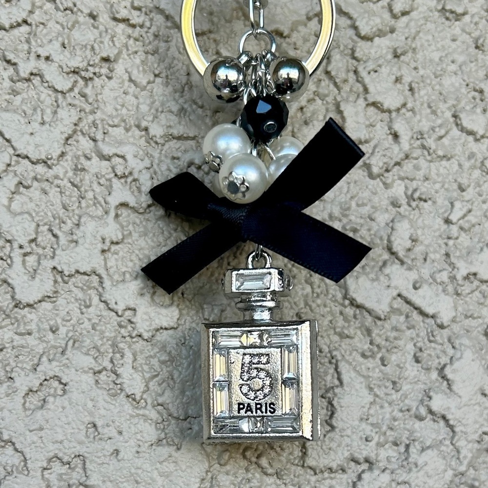 Luxe Silver Perfume Bottle Keychain/Bag Charm with Black Bow